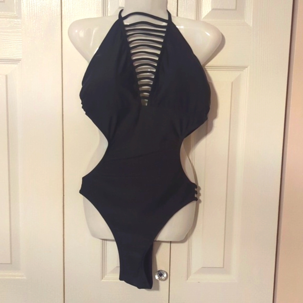 Sexy black one piece bathing suit.